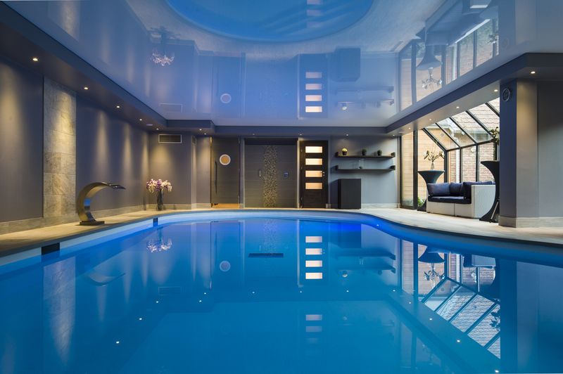 Spa Zen'ing Gondecourt — vue d'ensemble piscine avec véranda